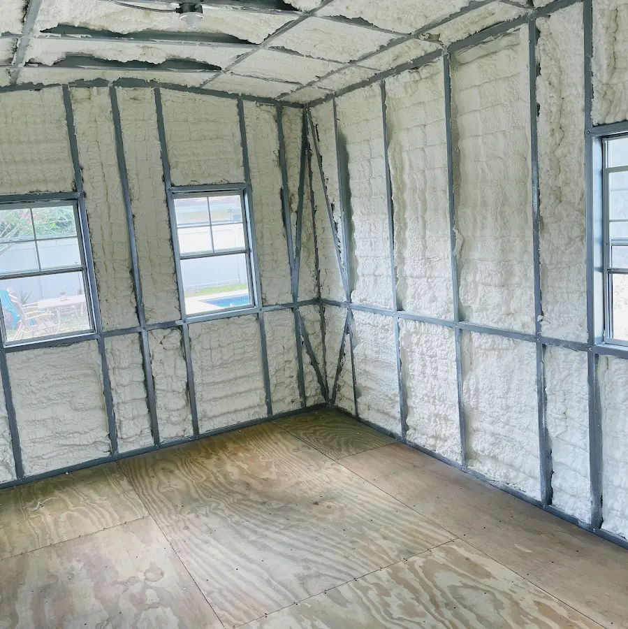 Closed-cell spray foam insulation applied to wall cavities in a residential project in Lake Hallie